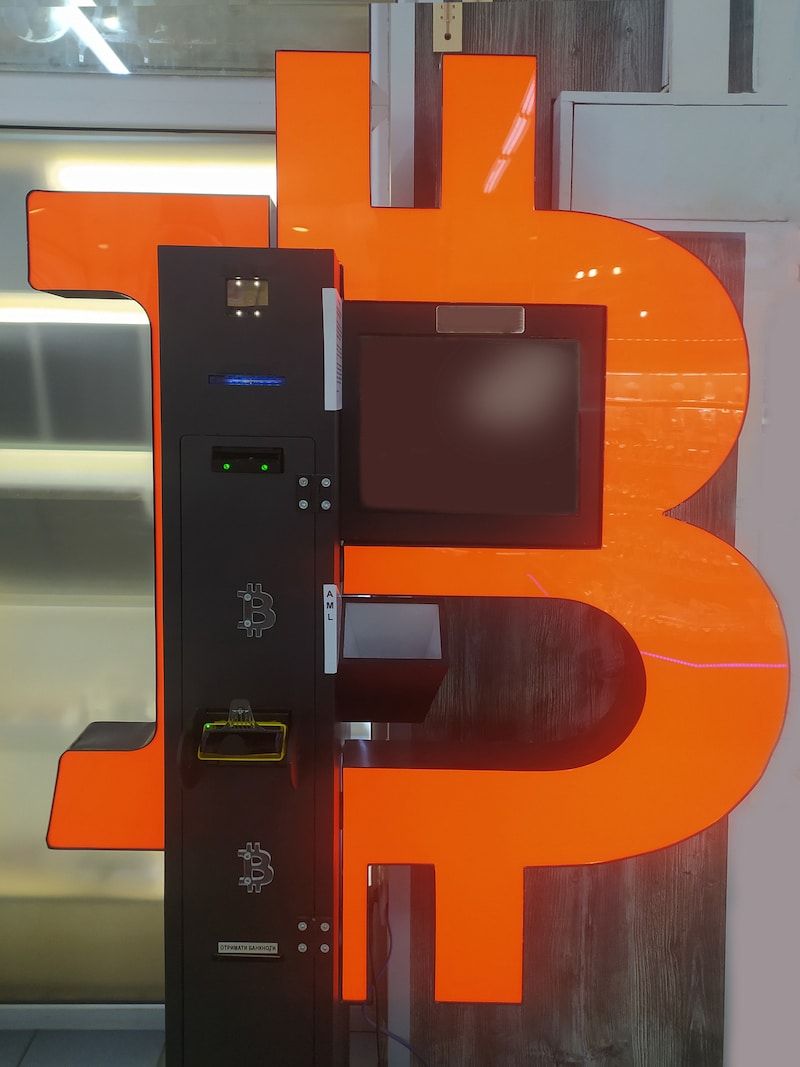 Bitcoin ATM device in the shopping center. New technology for selling and buying cryptocurrency Bitcoin ATM